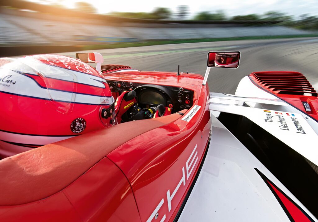 trackday-marco-werner-porsche-rs-spyder-lmp2--chassis-curbs-historic-motorsport-magazine-A-view-over-the-driver's-shoulder-at-Turn-1